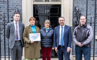 •	Picture: (L to R) Anthony Mangnall MP, Dr. Liz Dennis, Libby Price, Simon Jupp MP and Peter Kempton presenting the petition outside 10 Downing Street. 